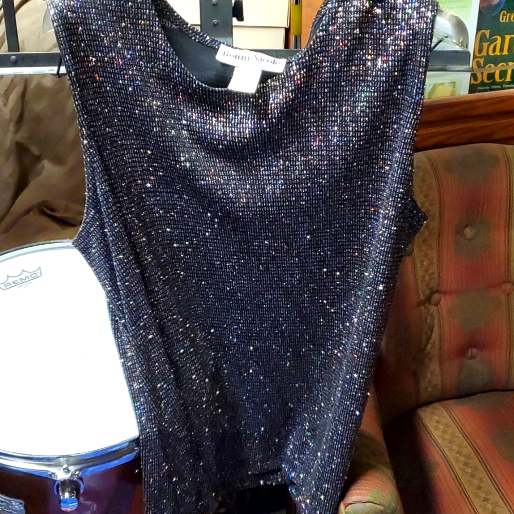 Top, black shell with multi color sparkles